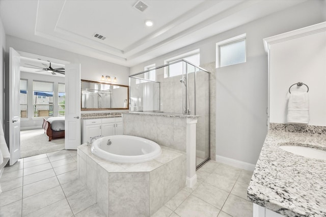 3005 Landmark Pl, Heath, TX 75126 - ensuite bathroom featuring vanity, a garden tub, a stall shower, and tile patterned floors