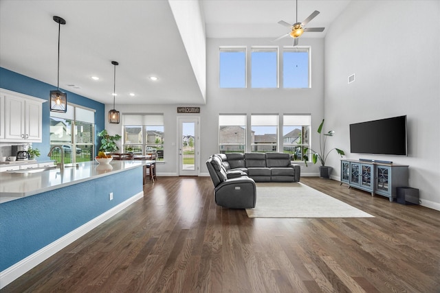 3005 Landmark Pl, Heath, TX 75126 - living area featuring ceiling fan, dark wood-style flooring, a high ceiling, and recessed lighting