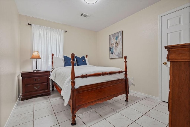1011 Reed Rd, Denton, TX 76205 - bedroom with light tile patterned floors