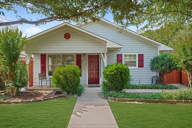 1011 Reed Rd, Denton, TX 76205 - view of front of house with a front lawn and covered porch