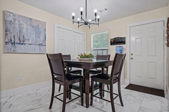 1011 Reed Rd, Denton, TX 76205 - dining space featuring light marble finish flooring and a chandelier