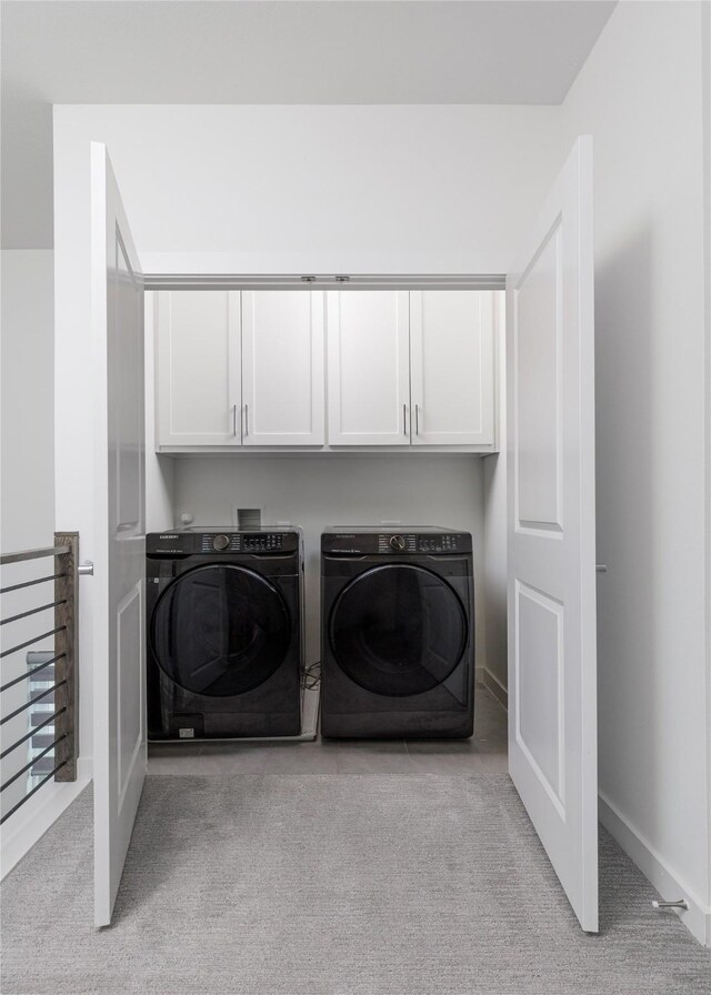 3811 Pine Leaf Ln, Prosper, TX 75078 - laundry room with cabinet space, washing machine and clothes dryer, and light carpet
