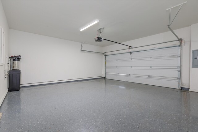 3811 Pine Leaf Ln, Prosper, TX 75078 - garage with electric panel and a garage door opener