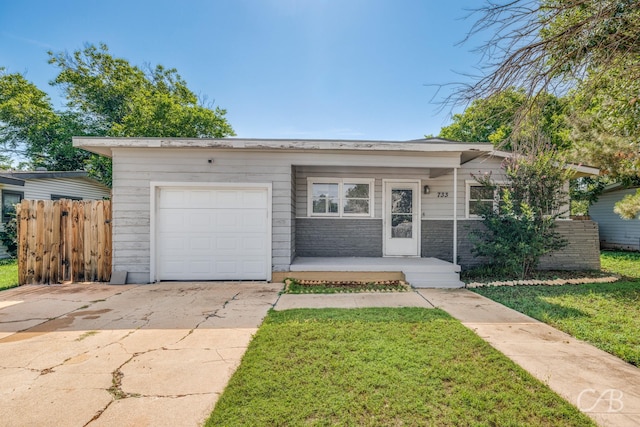 733 N Willis St, Abilene, TX 79603 - view of front of house with concrete driveway and an attached garage