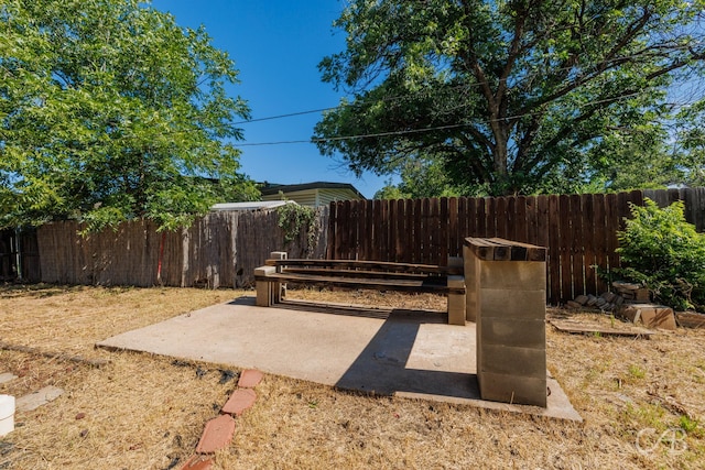 733 N Willis St, Abilene, TX 79603 - fenced backyard with a patio