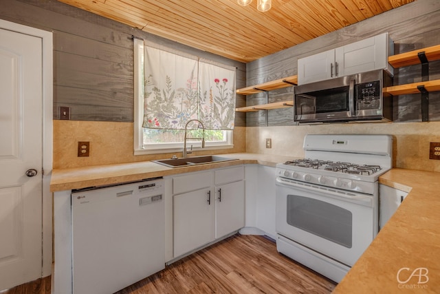733 N Willis St, Abilene, TX 79603 - kitchen featuring white appliances, open shelves, wooden ceiling, light countertops, and white cabinets