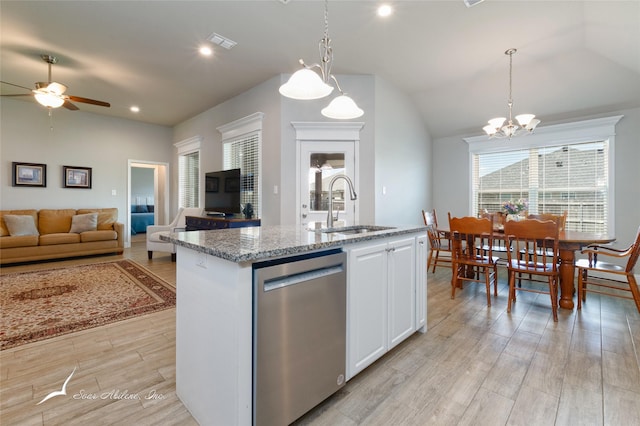 7362 Connor Rd, Abilene, TX 79602 - kitchen with dishwasher, lofted ceiling, light wood finished floors, ceiling fan, and light stone counters
