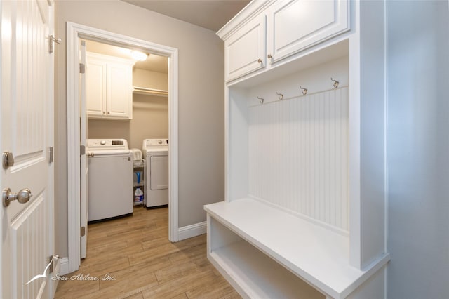 7362 Connor Rd, Abilene, TX 79602 - mudroom with washer and clothes dryer and light wood-style flooring
