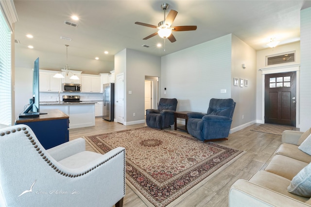7362 Connor Rd, Abilene, TX 79602 - living area featuring ceiling fan, light wood finished floors, recessed lighting, and vaulted ceiling