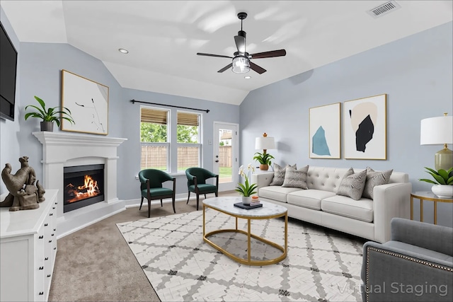 10305 Matador Dr, Mckinney, TX 75072 - living area featuring lofted ceiling, a ceiling fan, a warm lit fireplace, carpet, and recessed lighting