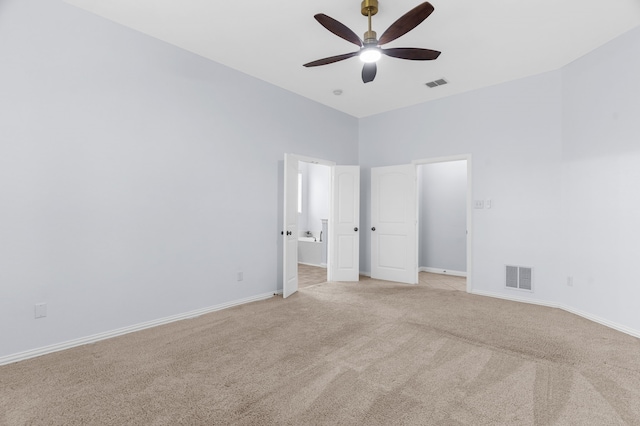 10305 Matador Dr, Mckinney, TX 75072 - unfurnished bedroom with light colored carpet, ensuite bath, and a ceiling fan