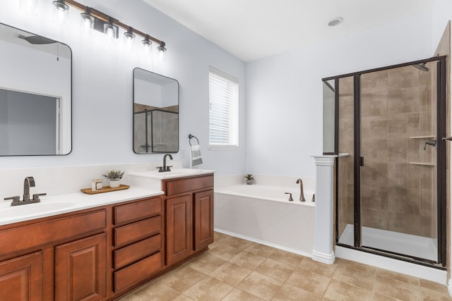 10305 Matador Dr, Mckinney, TX 75072 - full bathroom with a stall shower, double vanity, and a garden tub