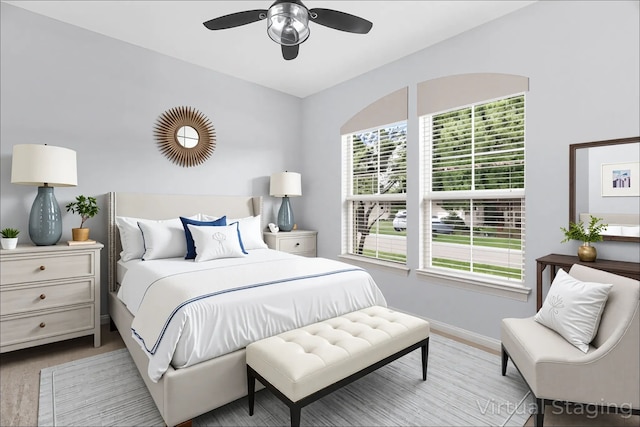 10305 Matador Dr, Mckinney, TX 75072 - bedroom with wood finished floors and ceiling fan