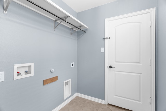 10305 Matador Dr, Mckinney, TX 75072 - washroom featuring hookup for a washing machine, hookup for an electric dryer, light tile patterned floors, and gas dryer hookup