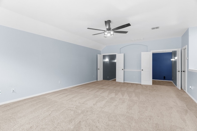 10305 Matador Dr, Mckinney, TX 75072 - unfurnished bedroom with light colored carpet, vaulted ceiling, and ceiling fan