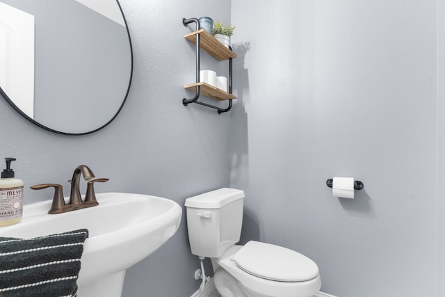 10305 Matador Dr, Mckinney, TX 75072 - half bath with toilet and a sink