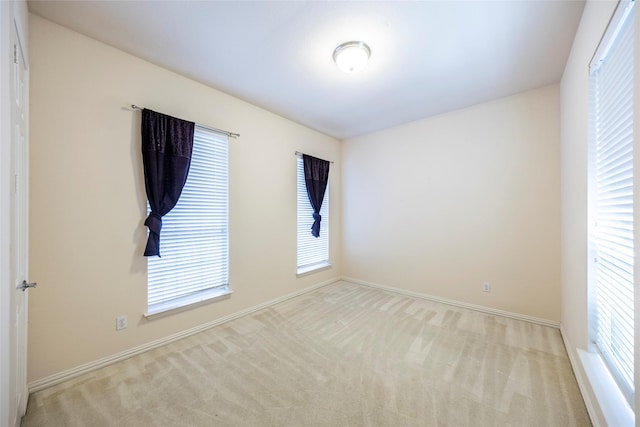 220 Justin Rd, Murphy, TX 75094 - spare room featuring carpet flooring and baseboards
