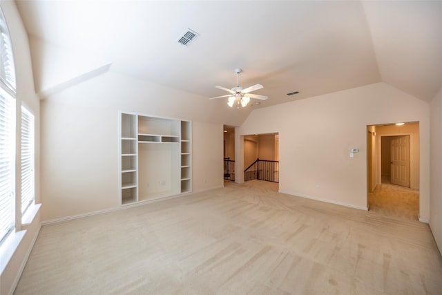 220 Justin Rd, Murphy, TX 75094 - unfurnished living room featuring lofted ceiling, plenty of natural light, ceiling fan, and light carpet
