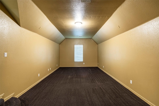 220 Justin Rd, Murphy, TX 75094 - additional living space with carpet and vaulted ceiling