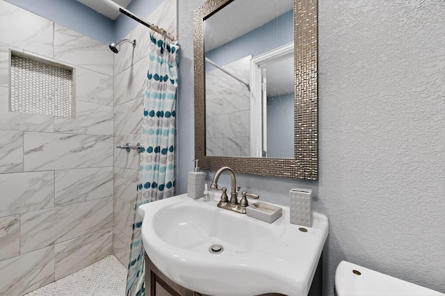 3832 Mount Ranier St, Dallas, TX 75211 - full bath with tiled shower and a textured wall