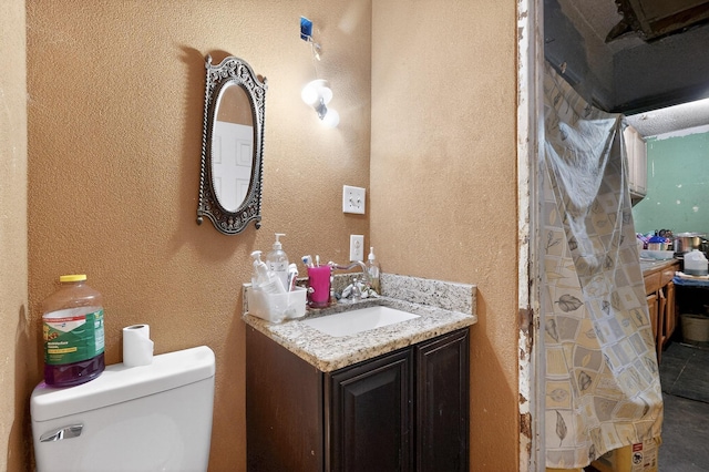 3832 Mount Ranier St, Dallas, TX 75211 - bathroom featuring vanity and a textured wall