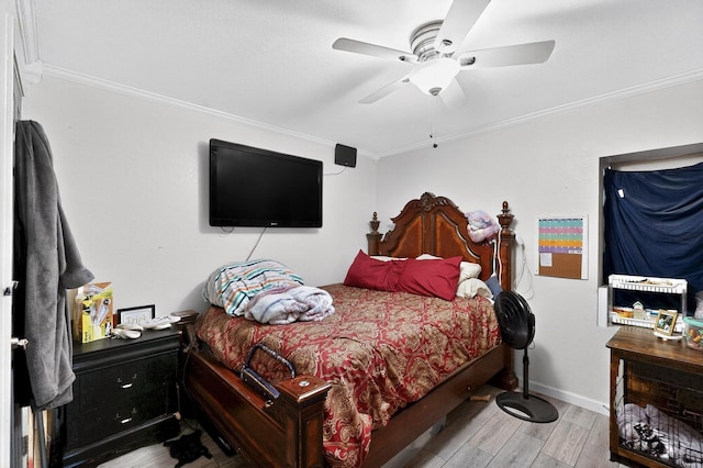 3832 Mount Ranier St, Dallas, TX 75211 - bedroom with ornamental molding, wood finished floors, and ceiling fan