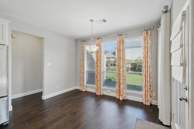 1617 Commons Way, Prosper, TX 75078 - unfurnished dining area with dark wood finished floors and baseboards