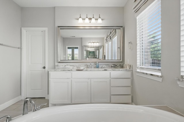 1617 Commons Way, Prosper, TX 75078 - bathroom with healthy amount of natural light, a bathtub, and vanity