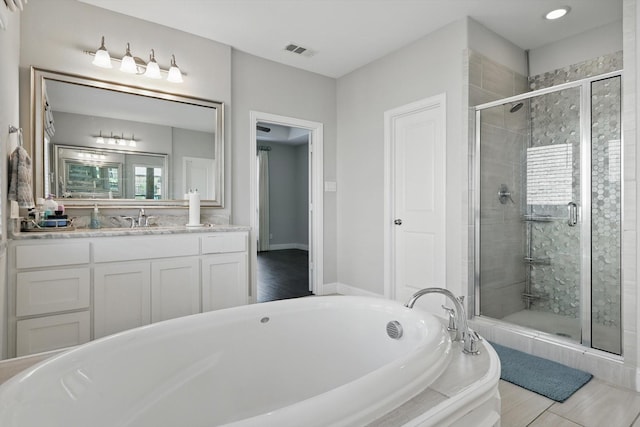 1617 Commons Way, Prosper, TX 75078 - full bath featuring a stall shower, a garden tub, and vanity