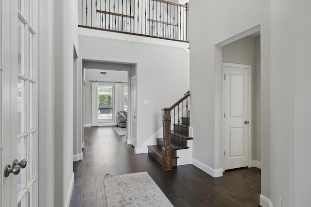 1617 Commons Way, Prosper, TX 75078 - foyer with dark wood-type flooring, stairway, and a high ceiling
