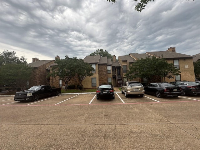 1909 Cloisters Dr Unit 1025, Arlington, TX 76011 - view of property with uncovered parking