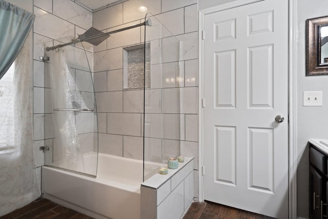 4443 Mercer St, Grand Prairie, TX 75052 - full bathroom with wood finished floors, shower / bathtub combination with curtain, and vanity