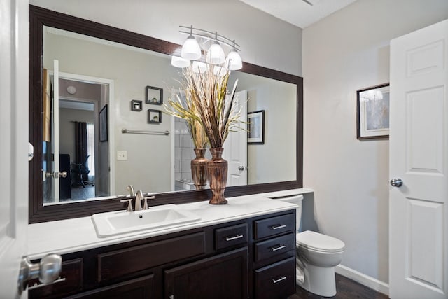 4443 Mercer St, Grand Prairie, TX 75052 - bathroom featuring vanity and wood finished floors