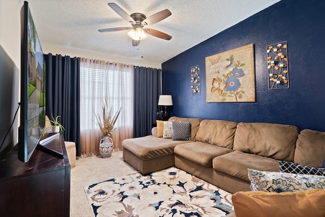 4443 Mercer St, Grand Prairie, TX 75052 - living area featuring a textured ceiling, ceiling fan, carpet, and a textured wall