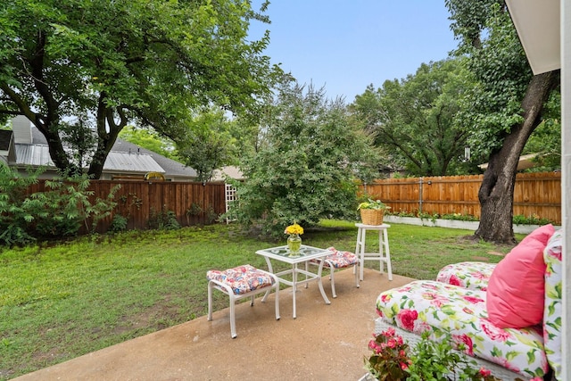 4443 Mercer St, Grand Prairie, TX 75052 - fenced backyard with a patio