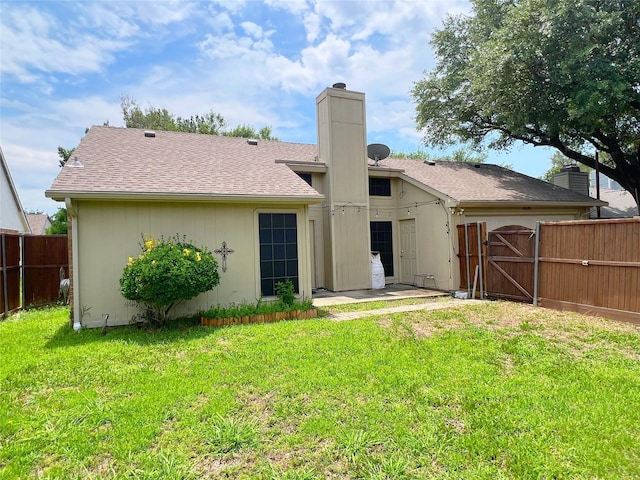 6828 Younger Dr, The Colony, TX 75056 - rear view of property with a chimney, a gate, and a shingled roof