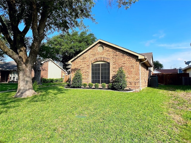 6828 Younger Dr, The Colony, TX 75056 - view of side of property featuring brick siding and a cooling unit