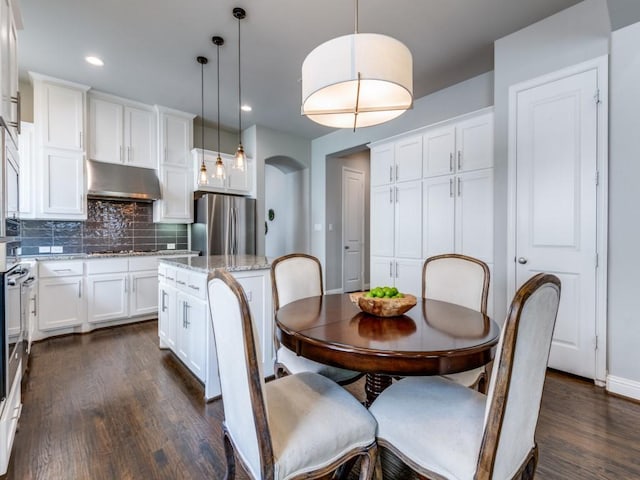4141 Maclin Dr, Celina, TX 75009 - dining room featuring dark wood-style floors and recessed lighting