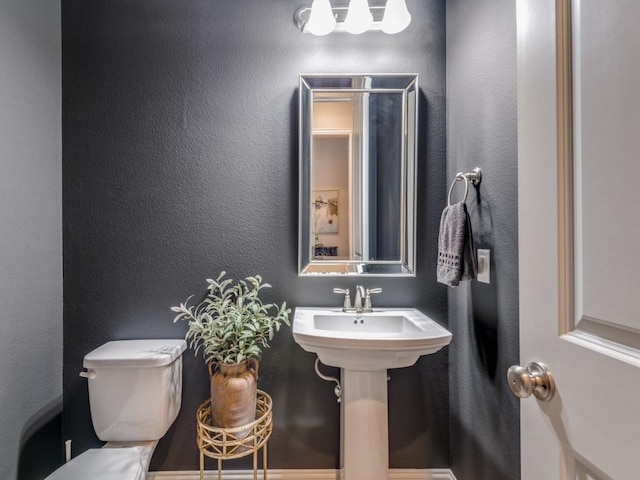 4141 Maclin Dr, Celina, TX 75009 - bathroom featuring toilet and a textured wall
