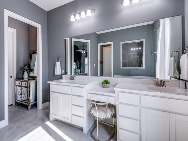 4141 Maclin Dr, Celina, TX 75009 - full bathroom with double vanity and tile patterned floors