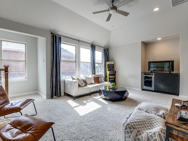 4141 Maclin Dr, Celina, TX 75009 - carpeted living room featuring a ceiling fan, wine cooler, lofted ceiling, and recessed lighting