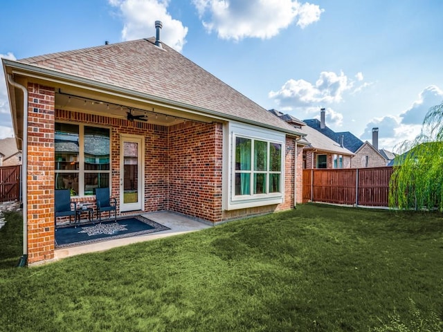 4141 Maclin Dr, Celina, TX 75009 - rear view of property with a fenced backyard, ceiling fan, brick siding, and a patio area