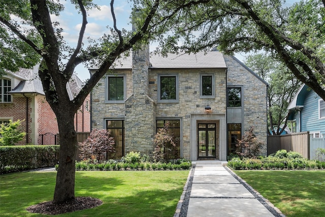 3725 Stratford Ave, Highland Park, TX 75205 - view of front of house featuring stone siding, french doors, and a front yard