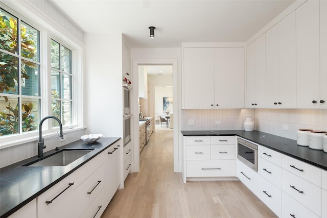 3725 Stratford Ave, Highland Park, TX 75205 - kitchen featuring stainless steel appliances, plenty of natural light, and dark countertops