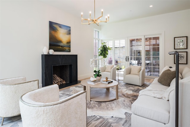 3725 Stratford Ave, Highland Park, TX 75205 - living room featuring a chandelier, a high end fireplace, and recessed lighting