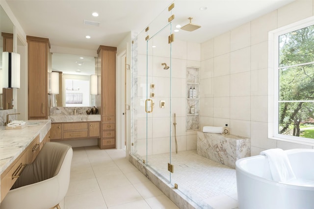 3725 Stratford Ave, Highland Park, TX 75205 - full bathroom with a shower stall, a freestanding bath, vanity, tile patterned floors, and recessed lighting