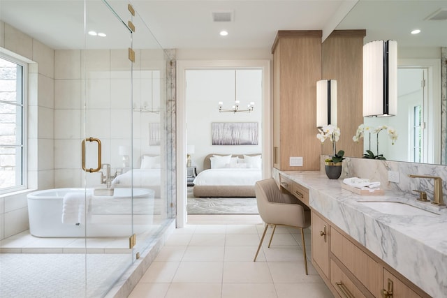 3725 Stratford Ave, Highland Park, TX 75205 - full bath with vanity, a shower stall, tile patterned flooring, ensuite bath, and a freestanding bath