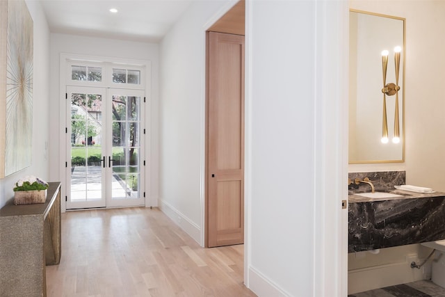 3725 Stratford Ave, Highland Park, TX 75205 - entryway with light wood-style floors, healthy amount of natural light, and recessed lighting