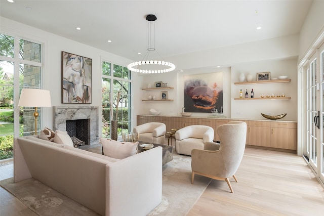3725 Stratford Ave, Highland Park, TX 75205 - living area featuring light wood-type flooring, a fireplace, and recessed lighting