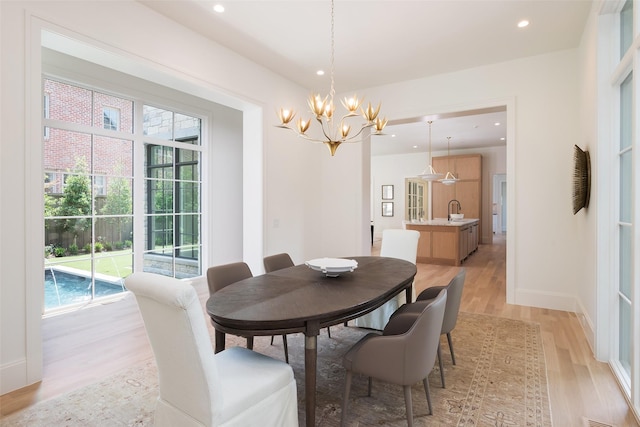 3725 Stratford Ave, Highland Park, TX 75205 - dining space with light wood-type flooring, a chandelier, plenty of natural light, and recessed lighting